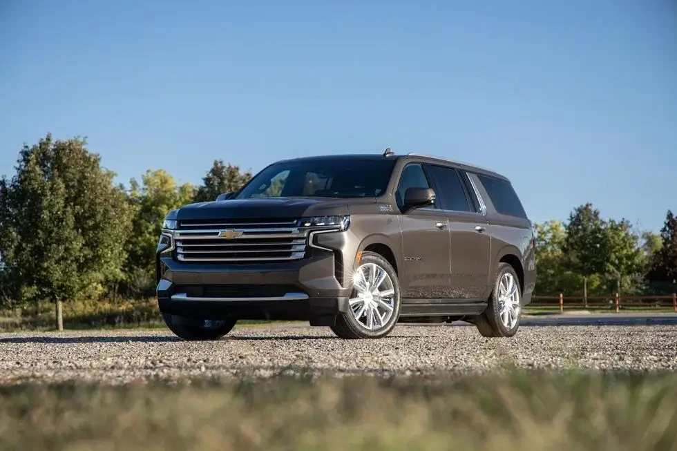 Chevrolet Suburban parked on a gravel road The Chevrolet Suburban is a large SUV that offers a front bench seat option making it a great choice for those who need to seat up to nine passengers