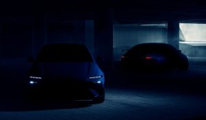 Dark teaser image of the 2026 Hyundai Ioniq 6 N showing front and rear silhouettes with aggressive lighting and performance styling.