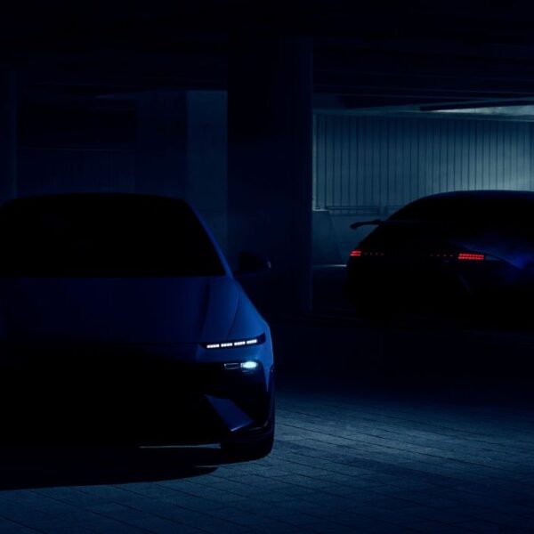 Dark teaser image of the 2026 Hyundai Ioniq 6 N showing front and rear silhouettes with aggressive lighting and performance styling.