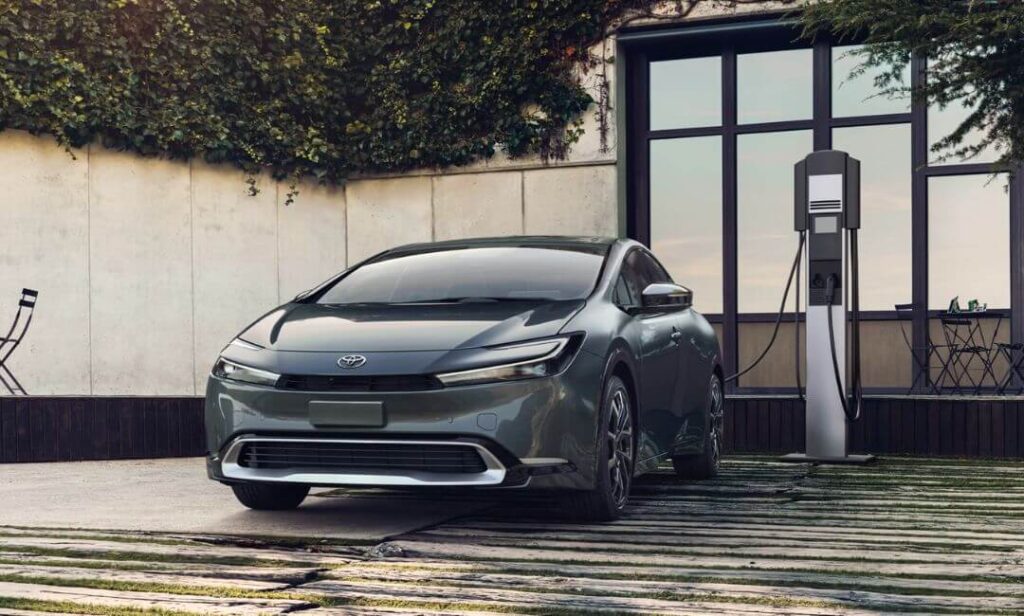 2025 Toyota Prius Hybrid in silver offering up to 57 MPG fuel efficiency
