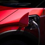 Passenger-side NACS fast charge port enabling DC fast charging up to 150 kW at Tesla Superchargers.