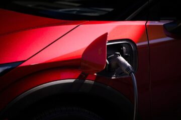 Passenger-side NACS fast charge port enabling DC fast charging up to 150 kW at Tesla Superchargers.