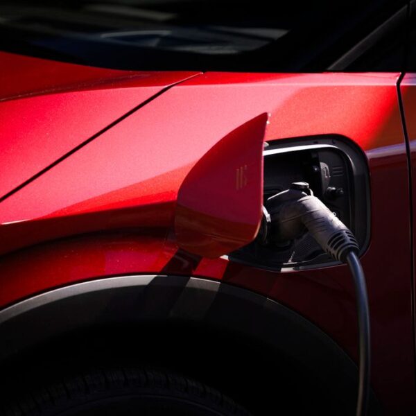 Passenger-side NACS fast charge port enabling DC fast charging up to 150 kW at Tesla Superchargers.