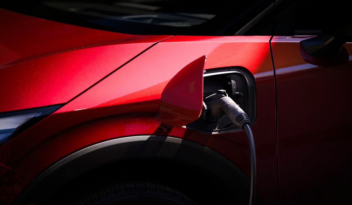 Passenger-side NACS fast charge port enabling DC fast charging up to 150 kW at Tesla Superchargers.